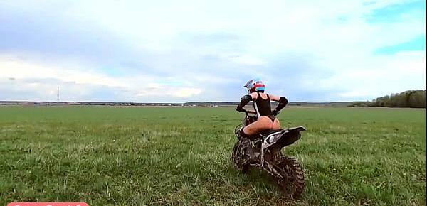  Naked woman riding a Dirt Bike